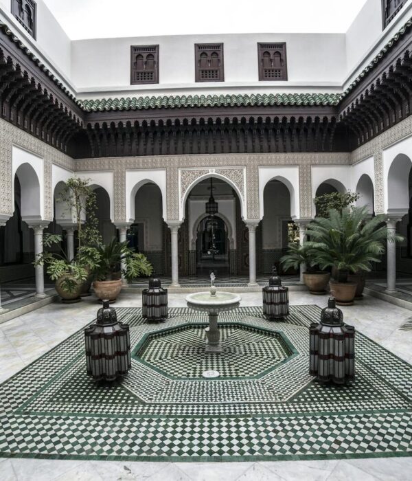 Explore this serene and intricately designed Moroccan courtyard in Marrakech.
